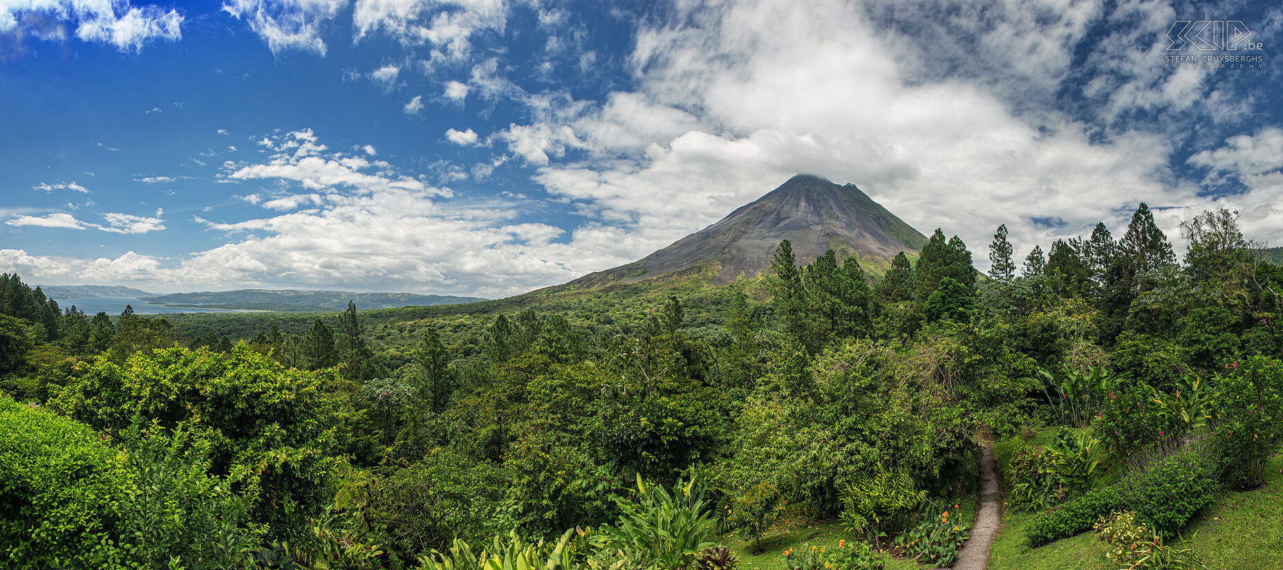 Arenal volcano and lake The scenery of the Arenal volcano and the lake from the terrace of our wonderful Observatory lodge.The Arenal volcano is conically shaped with a crater and is 1633 meters high.  Stefan Cruysberghs